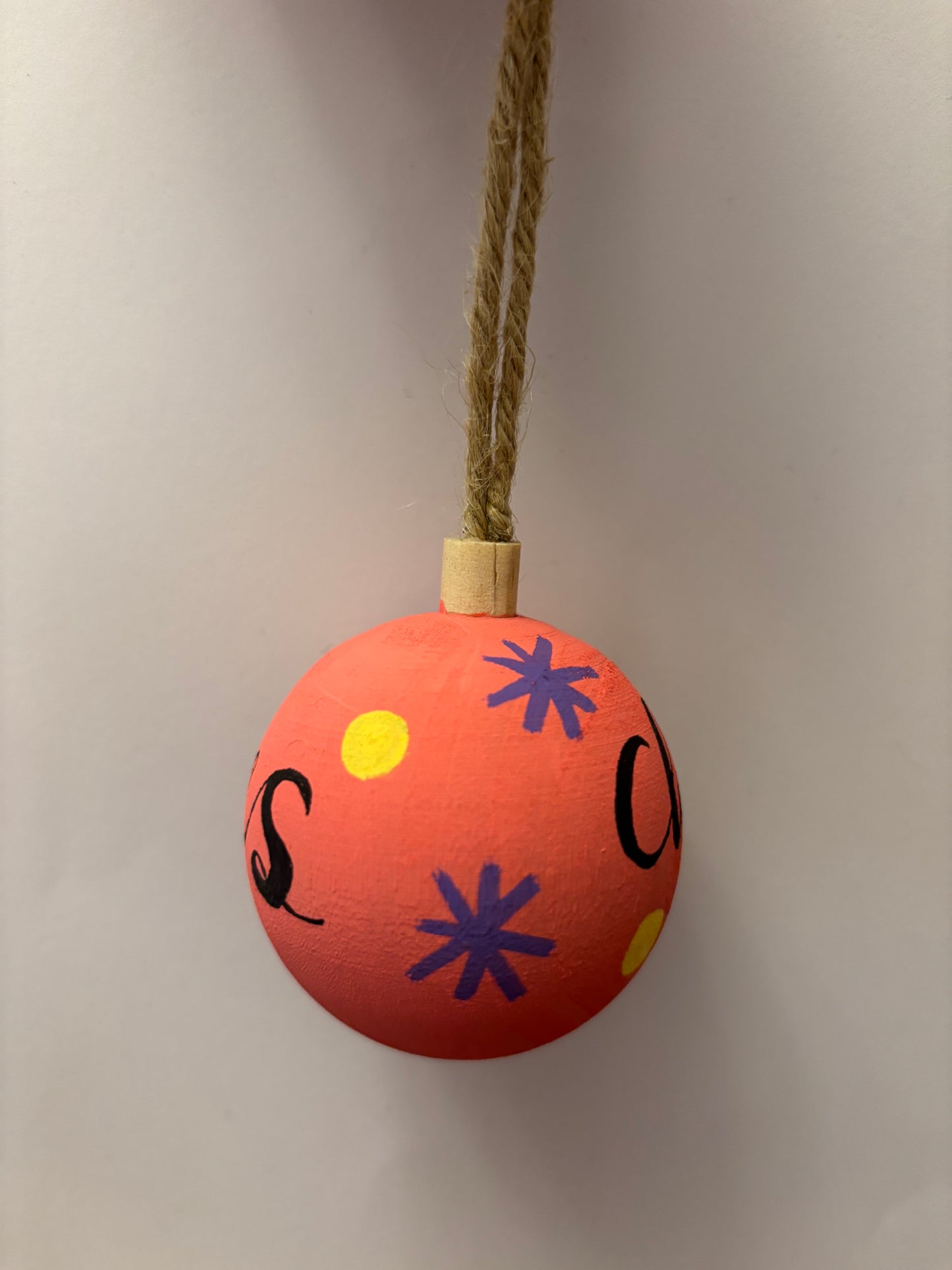 Pink starry wooden bauble