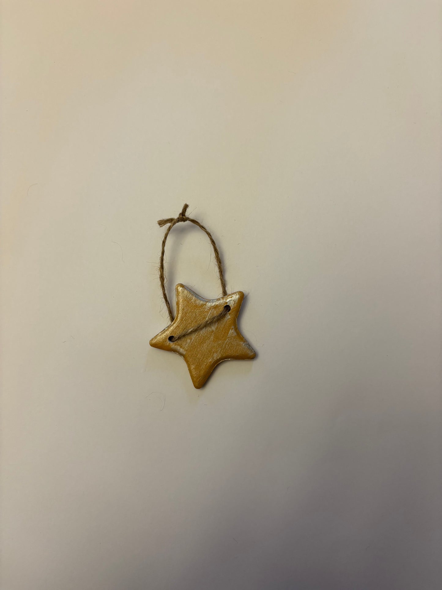 Gold ceramic star bauble