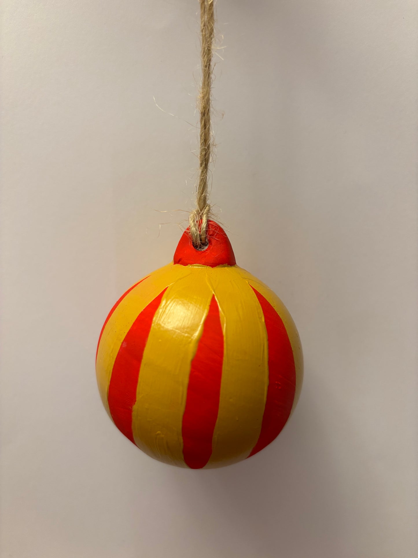 Red and gold striped bauble